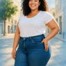 confident curvy woman wearing best jeans for curvy women in stylish urban setting