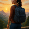 confident woman outdoors with best travel backpack for women symbolizing adventure and style