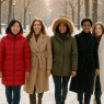 diverse women wearing best winter coats for women walking confidently in snowy park winter fashion